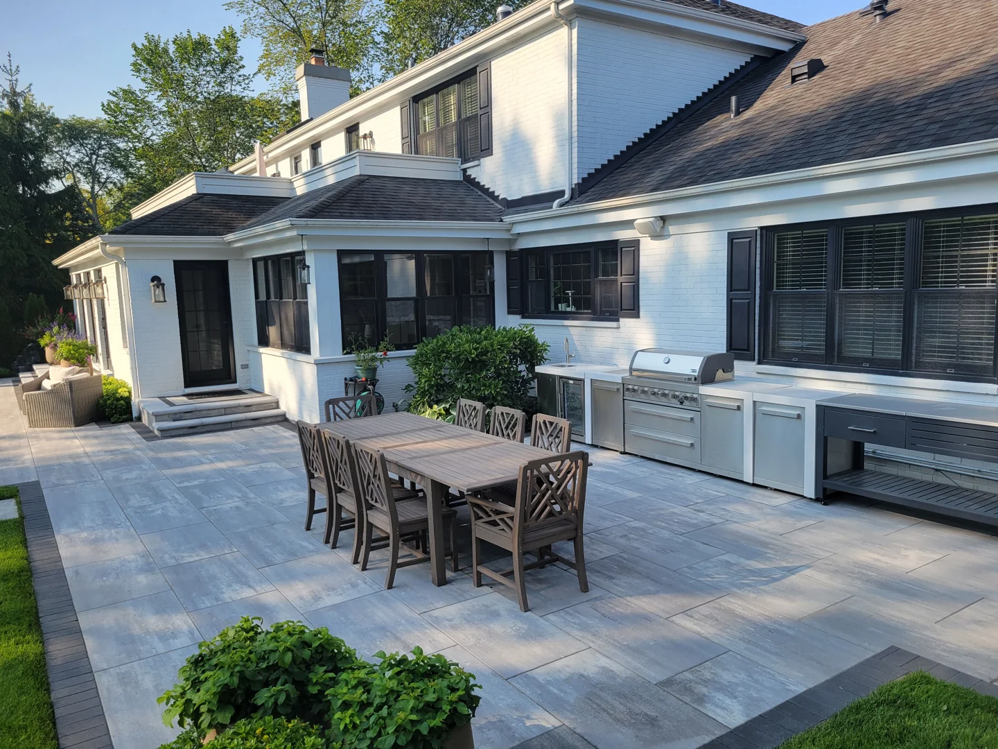 high-end brick paving installation in a luxury backyard - brick patio floor