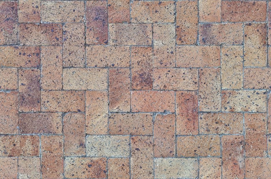 Herringbone pattern brick walkway showing intricate interlocking joints - brick patio ideas Herringbone pattern brick walkway showing intricate interlocking joints - brick patio ideas