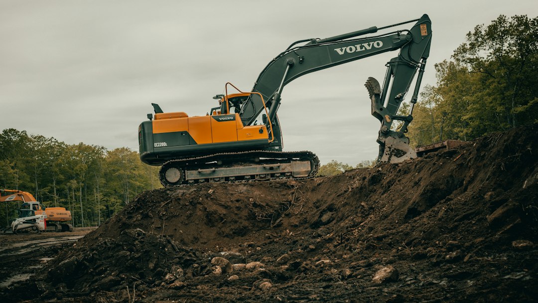 Professional excavation and base preparation for driveway paving