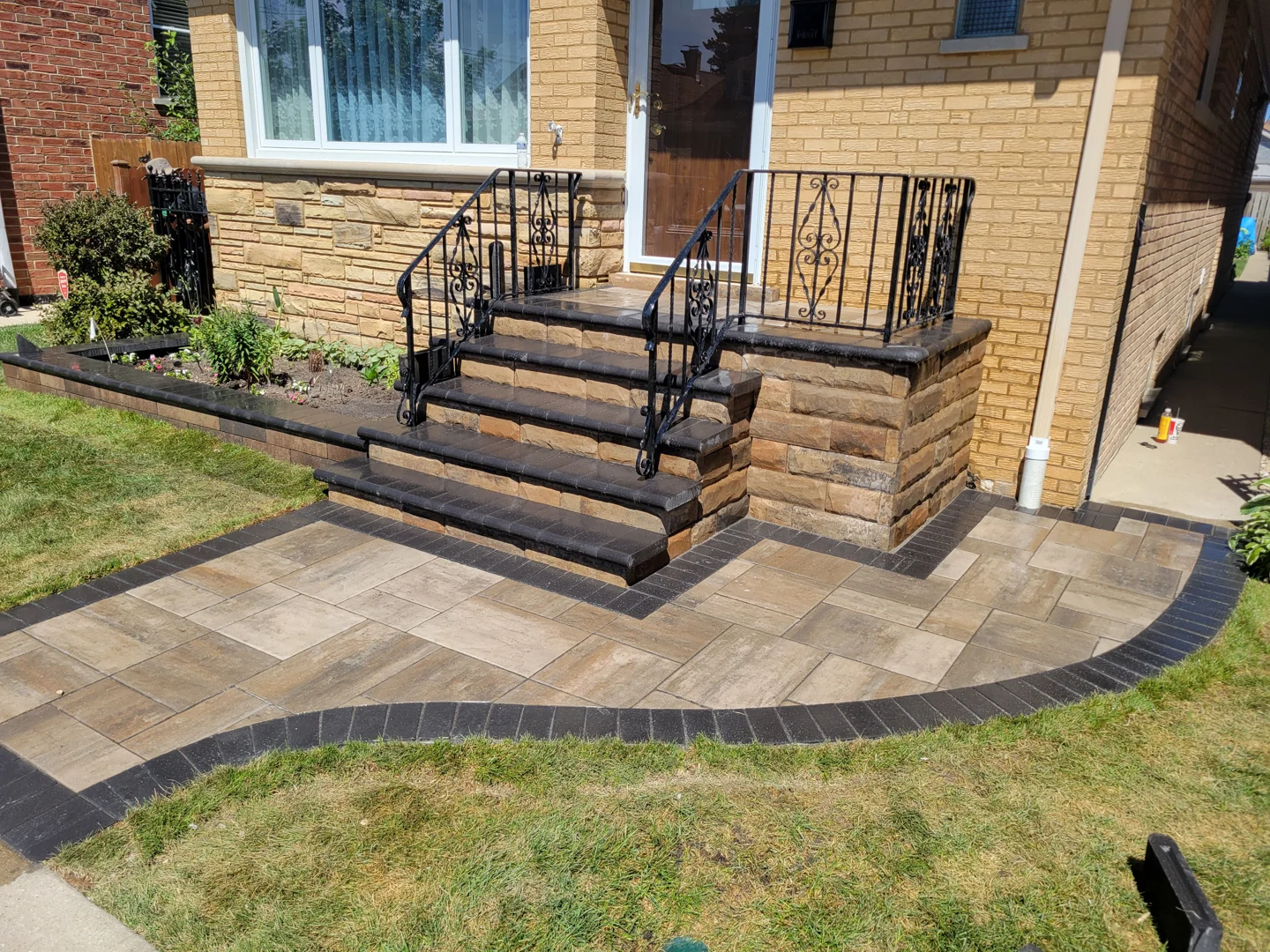 pavers next to concrete walkway