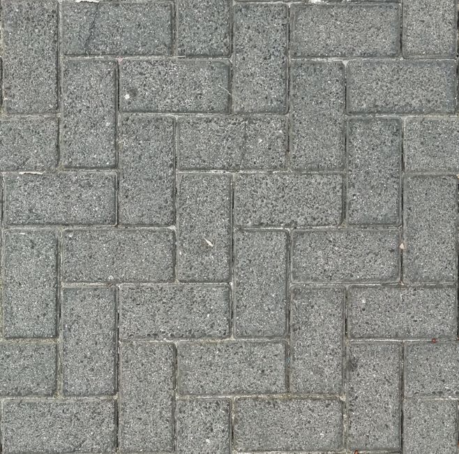 Unilock brick pavers in a herringbone pattern