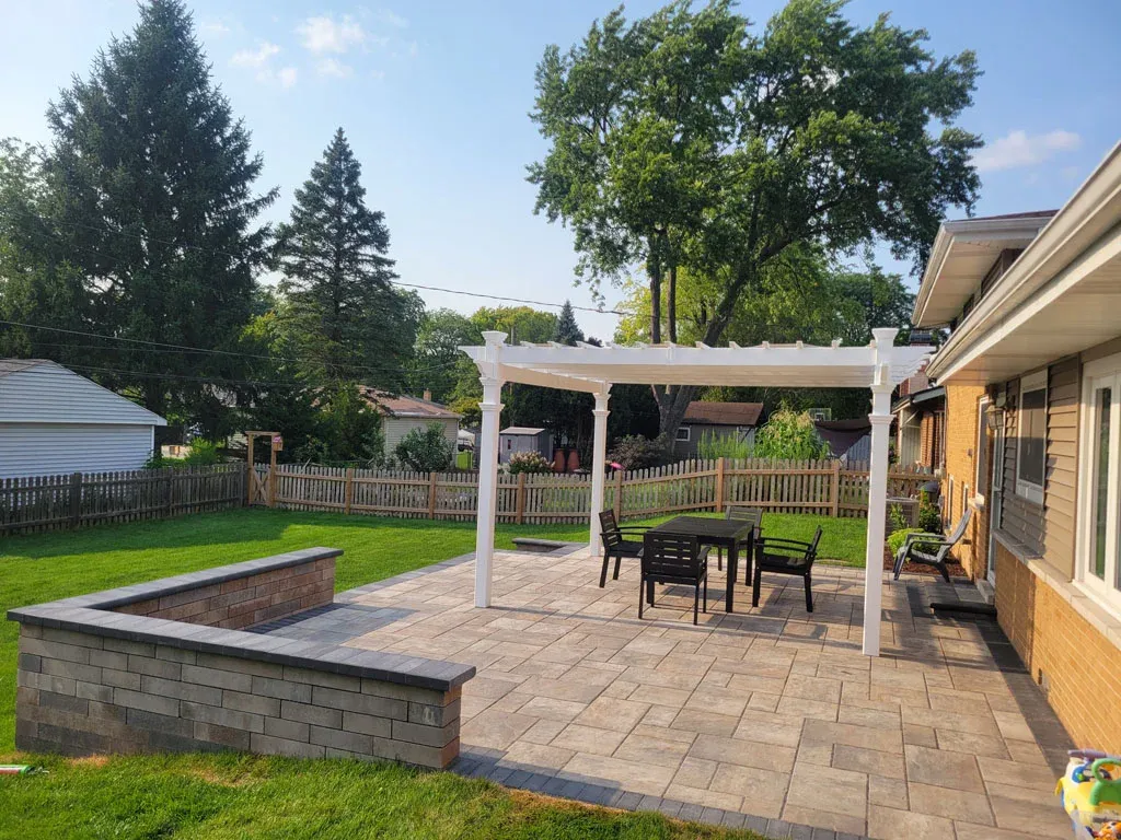 smooth poured concrete slab banded with clay brick pavers in Arlington Heights