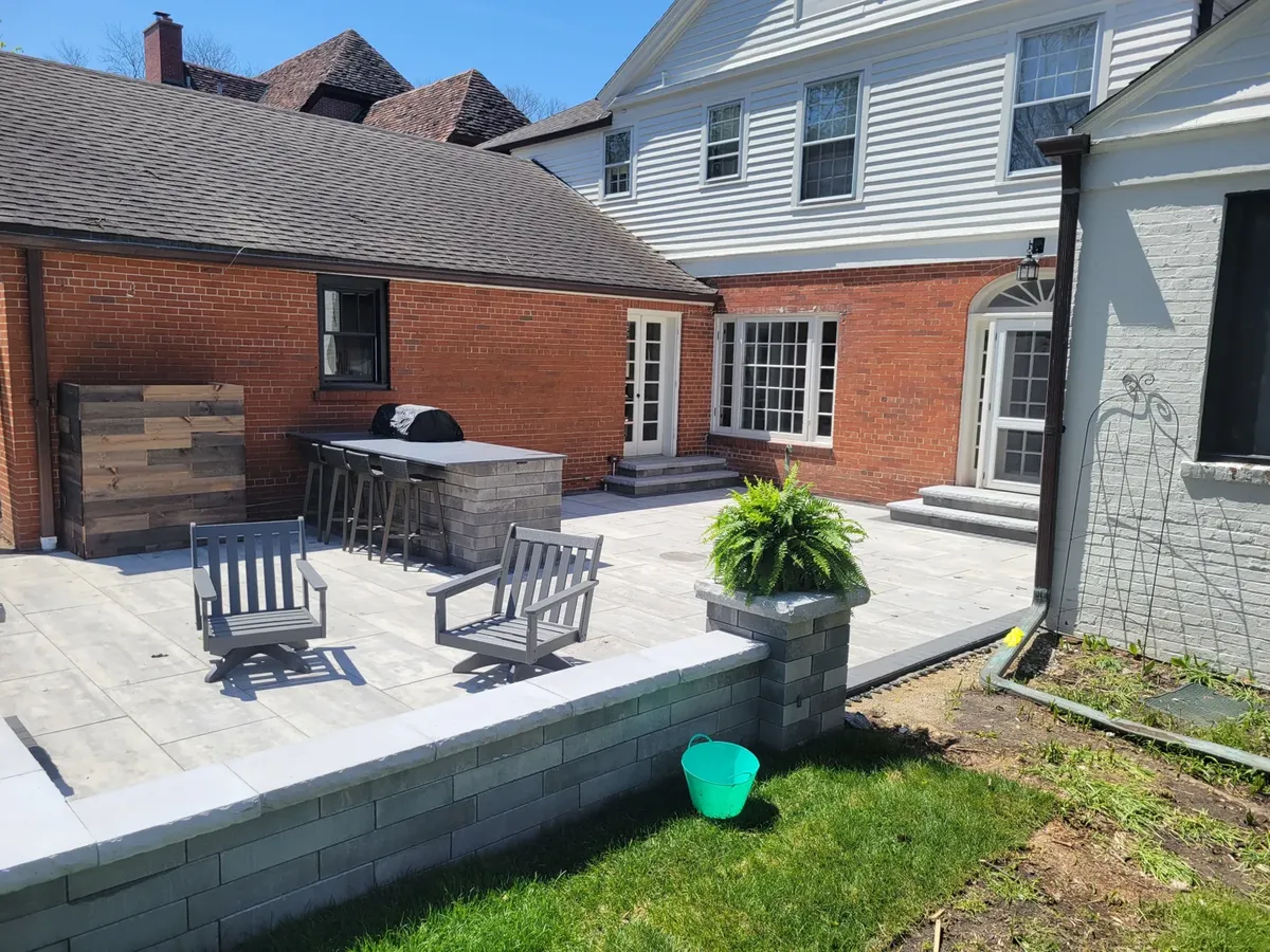 Commercial courtyard outdoor kitchen with heavy-duty brick paving in Arlington Heights